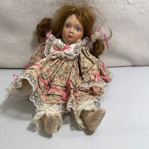 Vintage MBI 1989 Porcelain Doll Blue Eyes‎ Floral Dress Pigtails Collectible